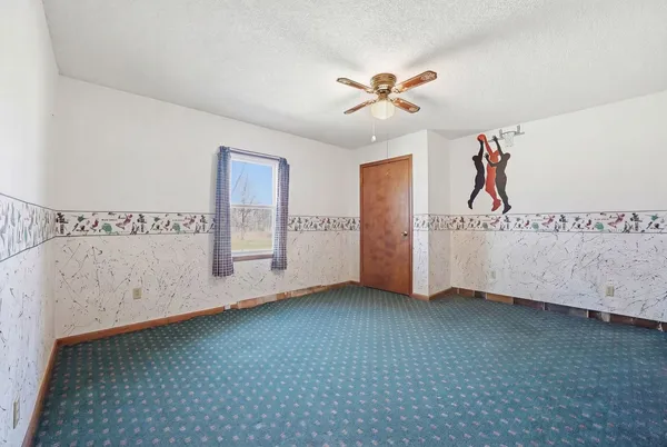 a view of a room with rack on the wall