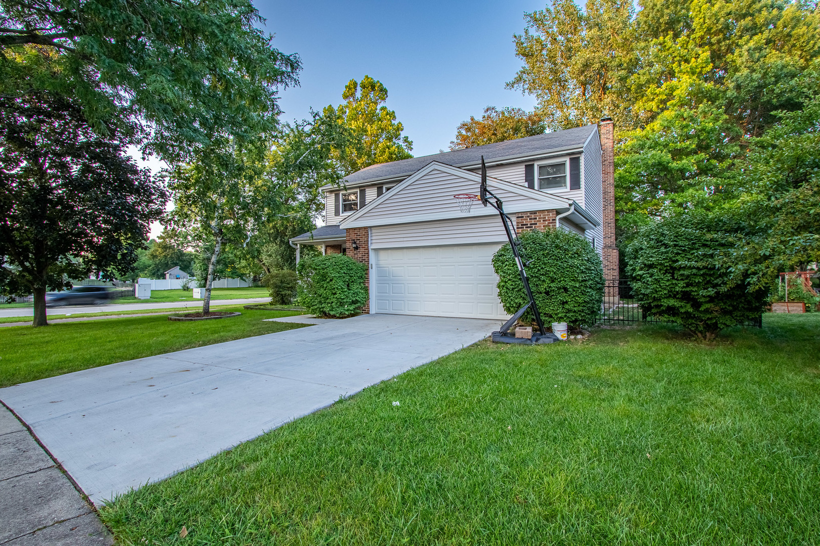 1201 Pinetree Lane Bartlett, IL 60103 - Photo 1 of 24 a front view of house with yard and green space