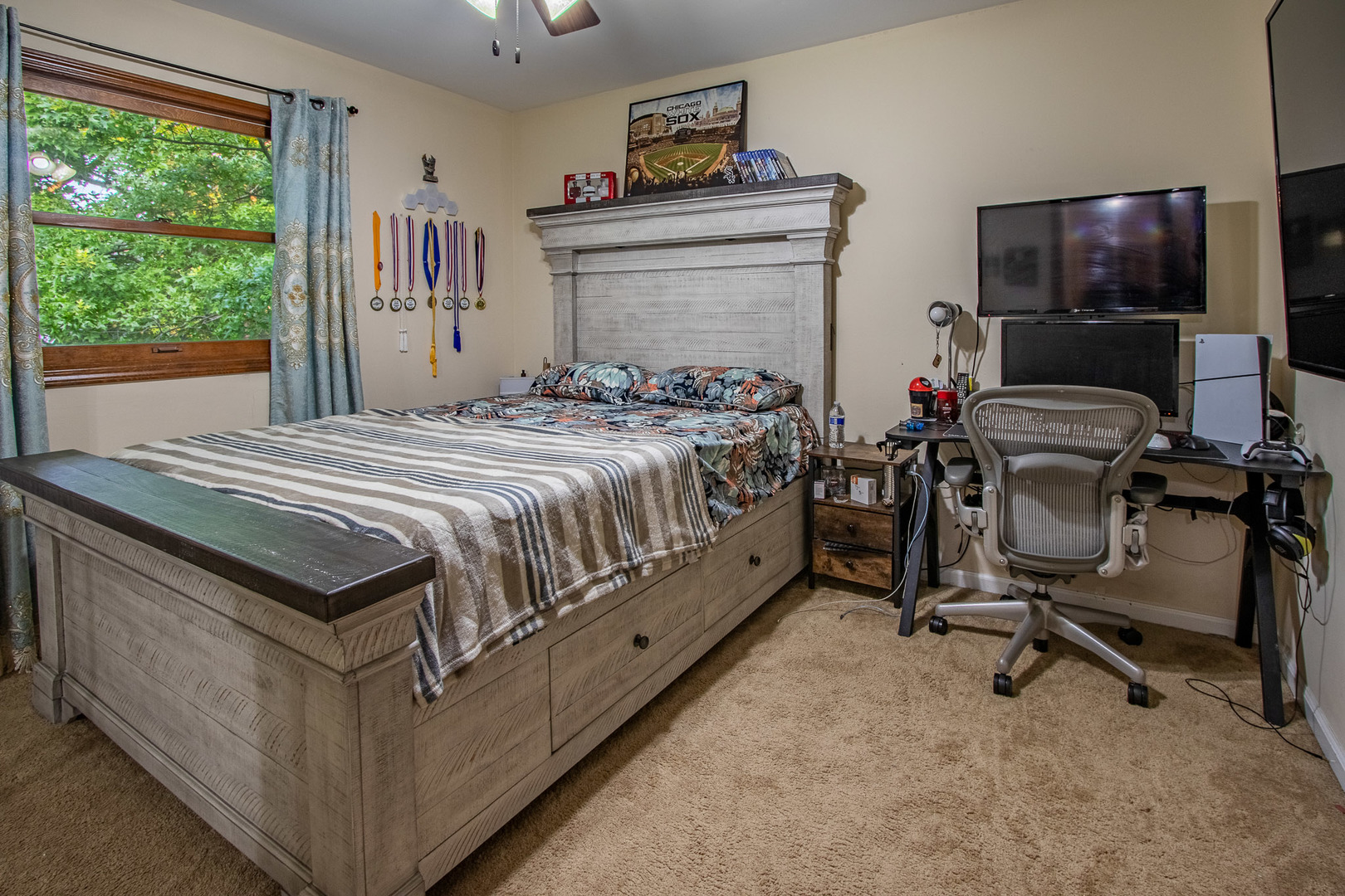 1201 Pinetree Lane Bartlett, IL 60103 - Photo 12 of 24 a bed room with a bed and a television