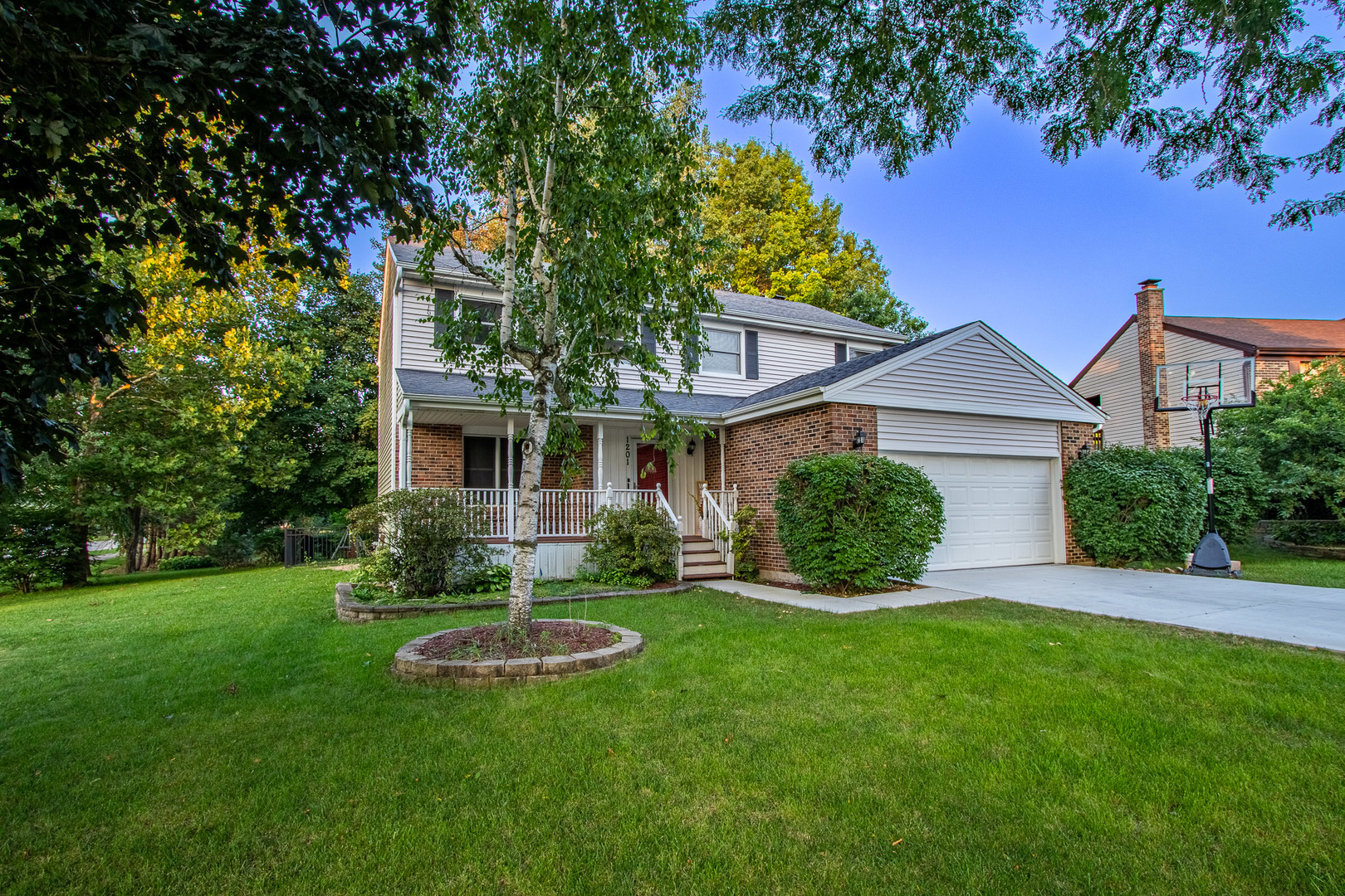 1201 Pinetree Lane Bartlett, IL 60103 - Photo 2 of 24 a view of a house with a yard and a large tree