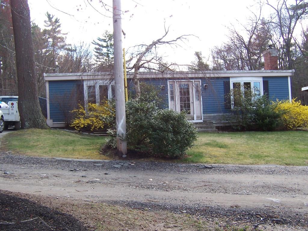 12 Hough Road Douglas, MA 01516 - Photo 2 of 22 a front view of a house with garden