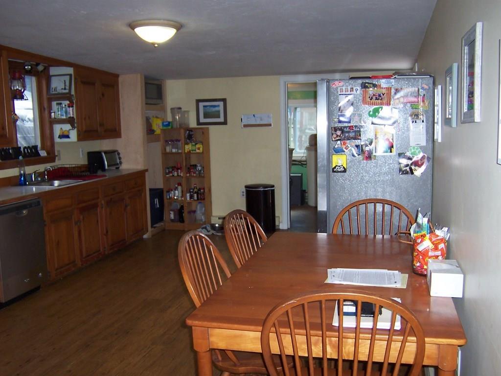 12 Hough Road Douglas, MA 01516 - Photo 3 of 22 a view of a dining room with furniture a bedroom and a window