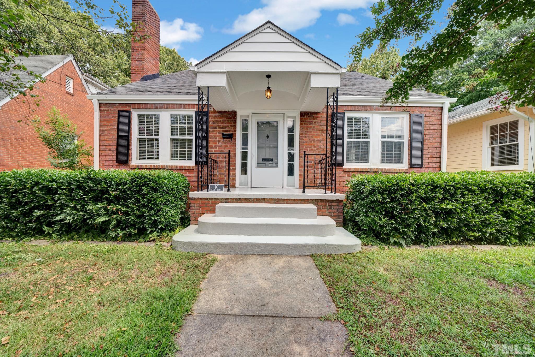 10 Dixie Trail Raleigh, NC 27607 - Photo 1 of 27 front view of a house with a yard