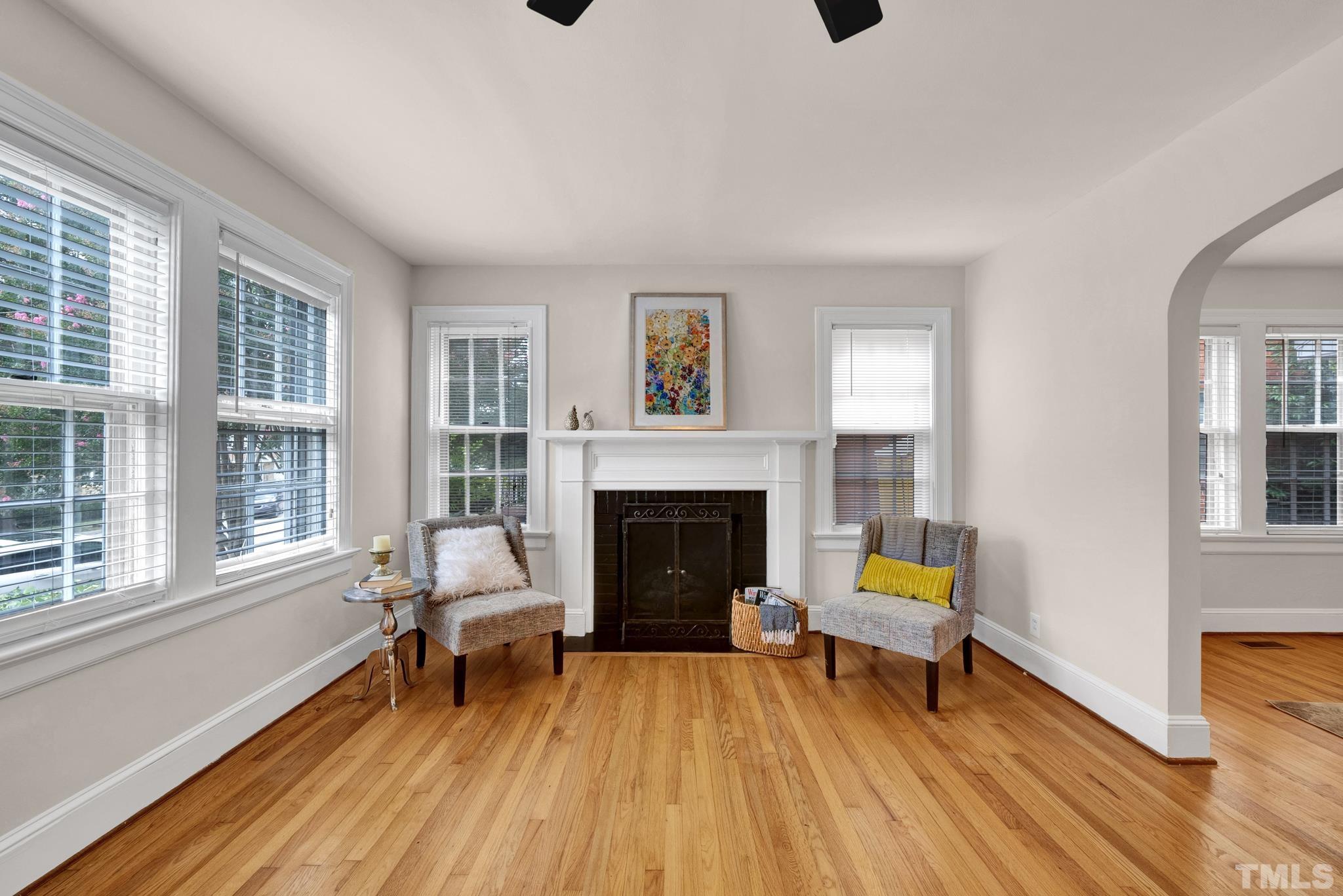 10 Dixie Trail Raleigh, NC 27607 - Photo 5 of 27 a living room with furniture and a fireplace