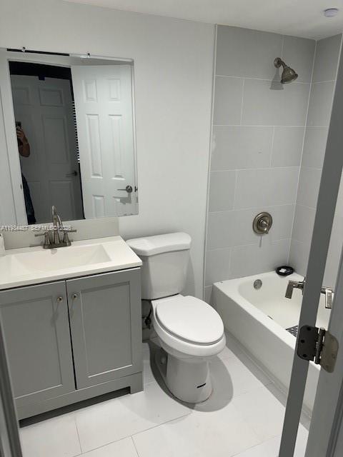 1250 Southeast 26th Street, Unit 102 Homestead, FL 33035 - Photo 15 of 16 a bathroom with a sink and a toilet