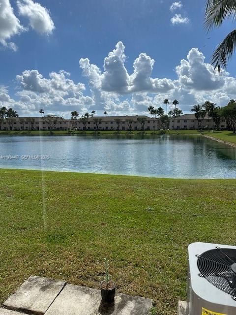 1250 Southeast 26th Street, Unit 102 Homestead, FL 33035 - Photo 16 of 16 a view of a lake in middle of the town