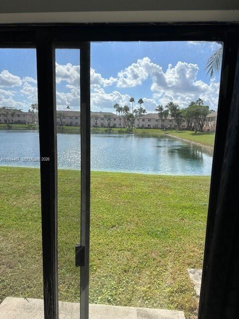 1250 Southeast 26th Street, Unit 102 Homestead, FL 33035 - Photo 7 of 16 a view of lake from a window