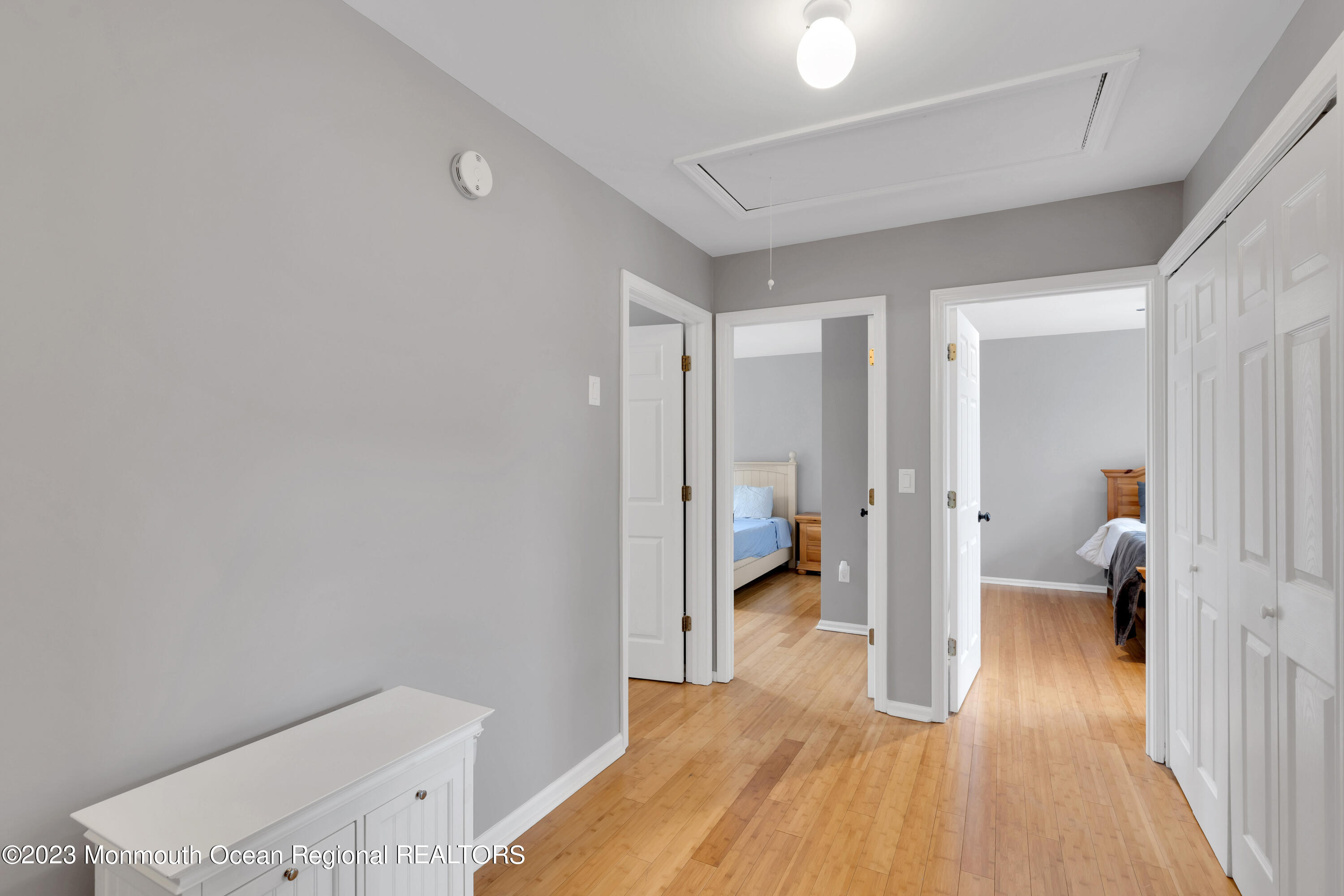 5 Autumn Drive Howell, NJ 07731 - Photo 28 of 50 a view of a bedroom with a bed and wooden floor