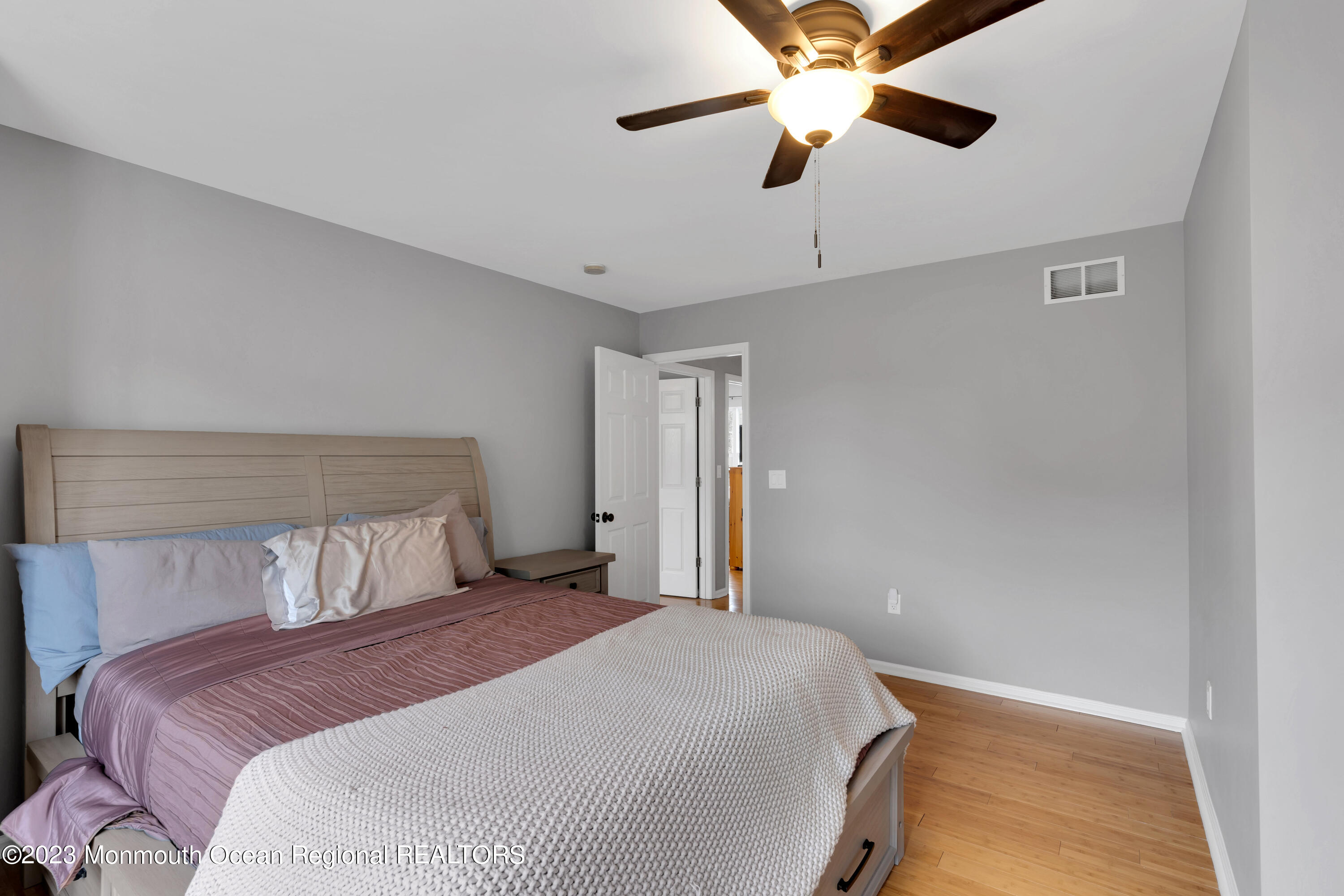 5 Autumn Drive Howell, NJ 07731 - Photo 31 of 50 a bedroom with a bed and a ceiling fan