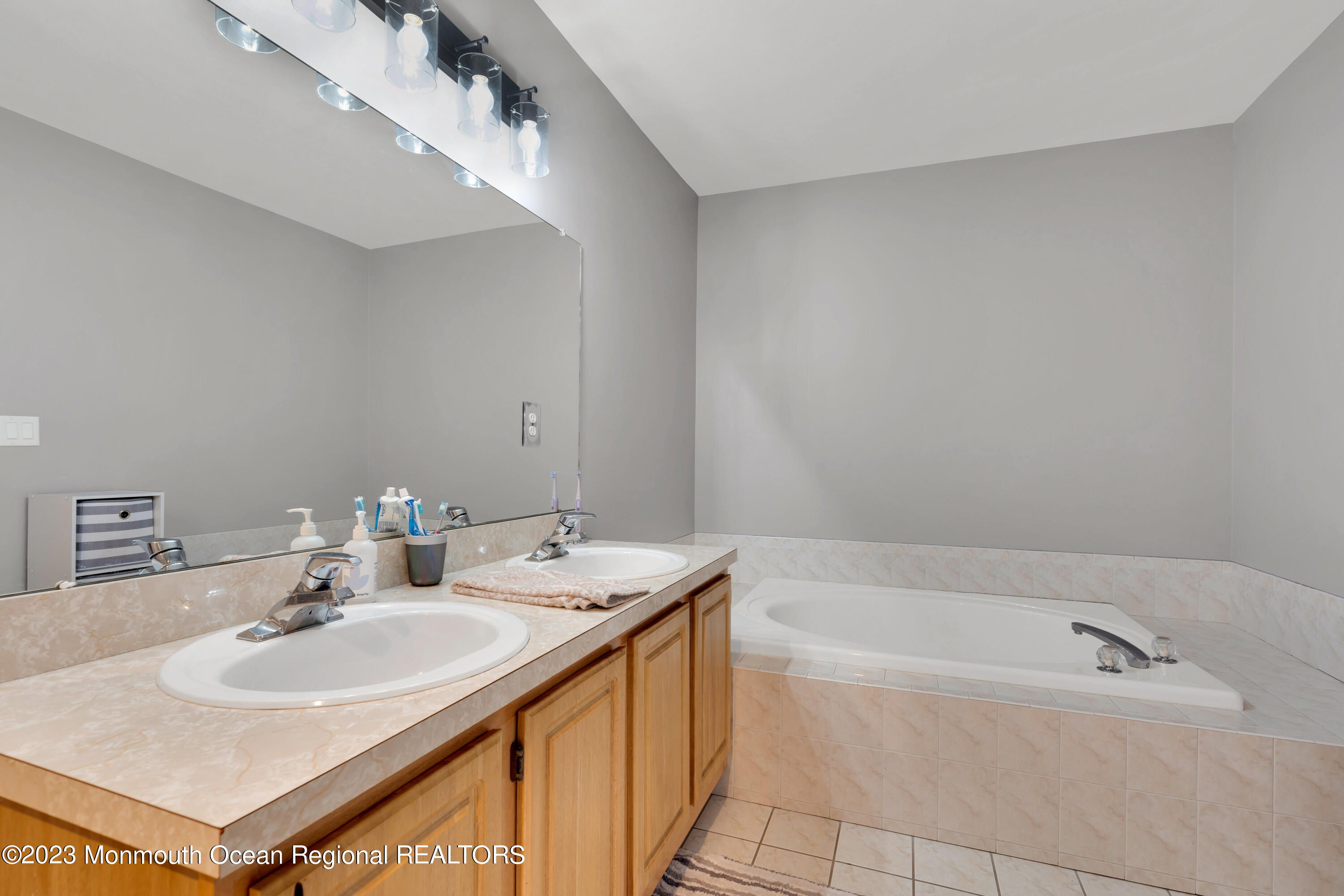 5 Autumn Drive Howell, NJ 07731 - Photo 36 of 50 a bathroom with a sink and a bathtub