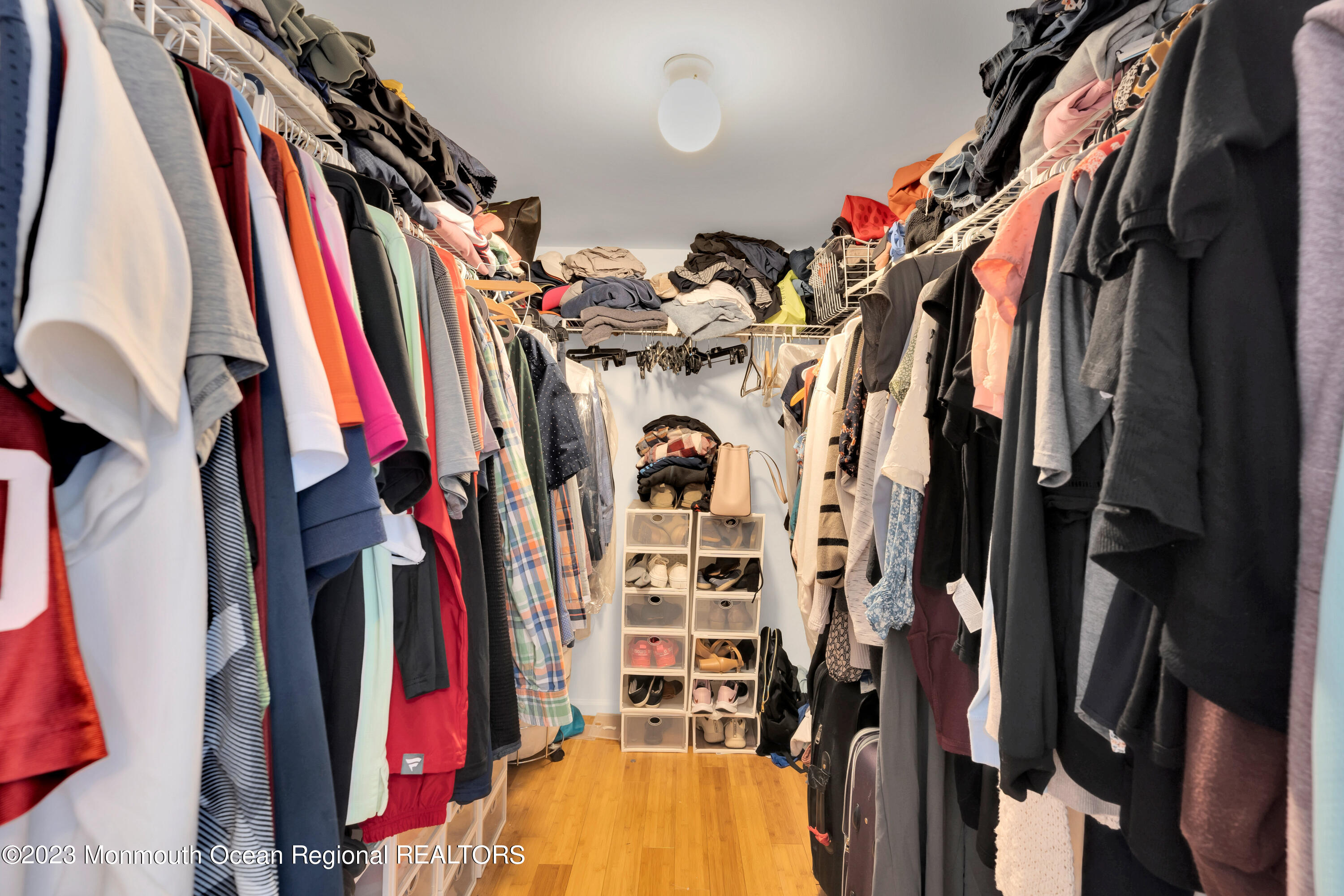 5 Autumn Drive Howell, NJ 07731 - Photo 38 of 50 a view of walk in closet with clothes and shoes