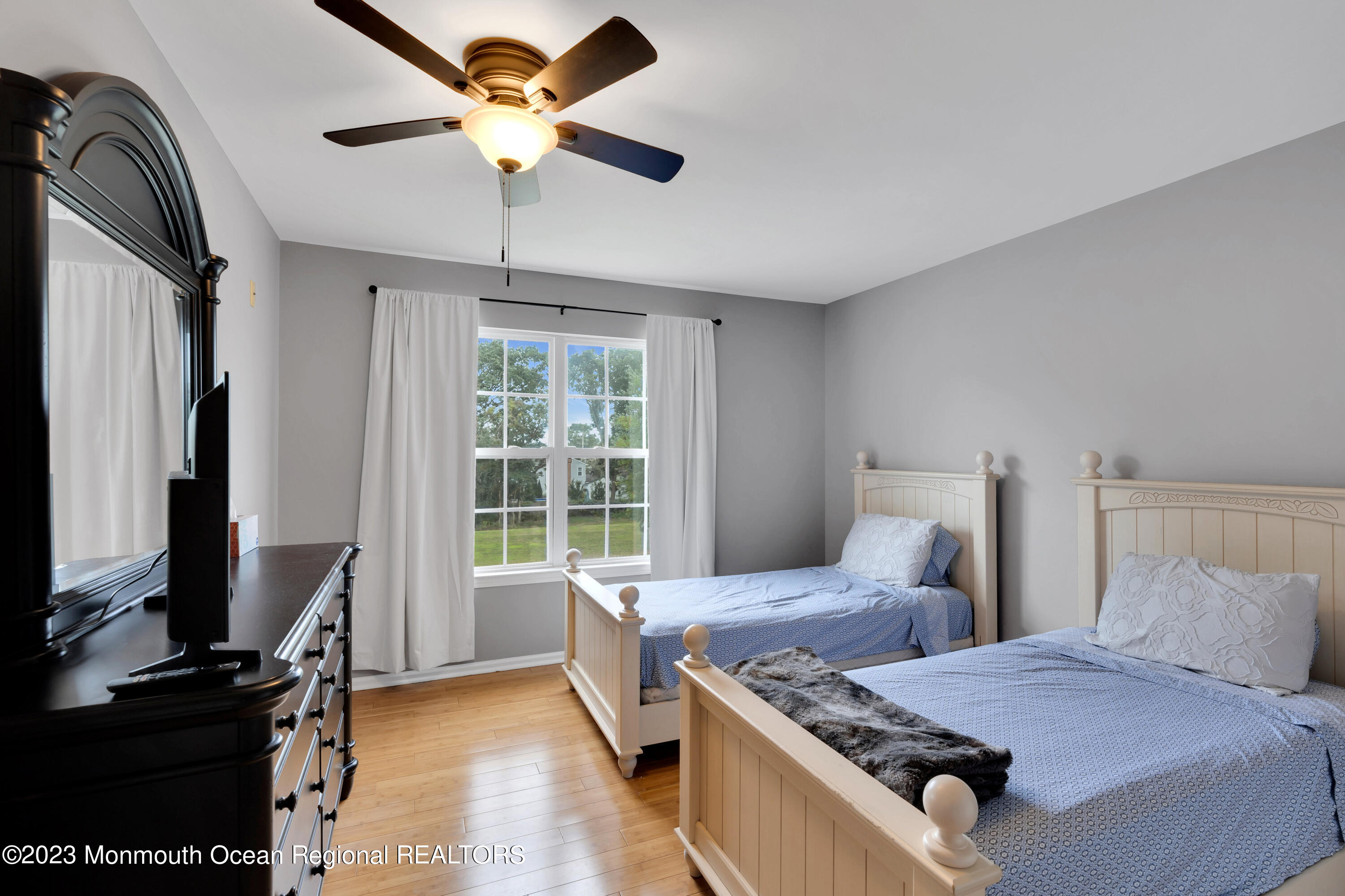 5 Autumn Drive Howell, NJ 07731 - Photo 5 of 50 a bedroom with a bed and a flat screen tv