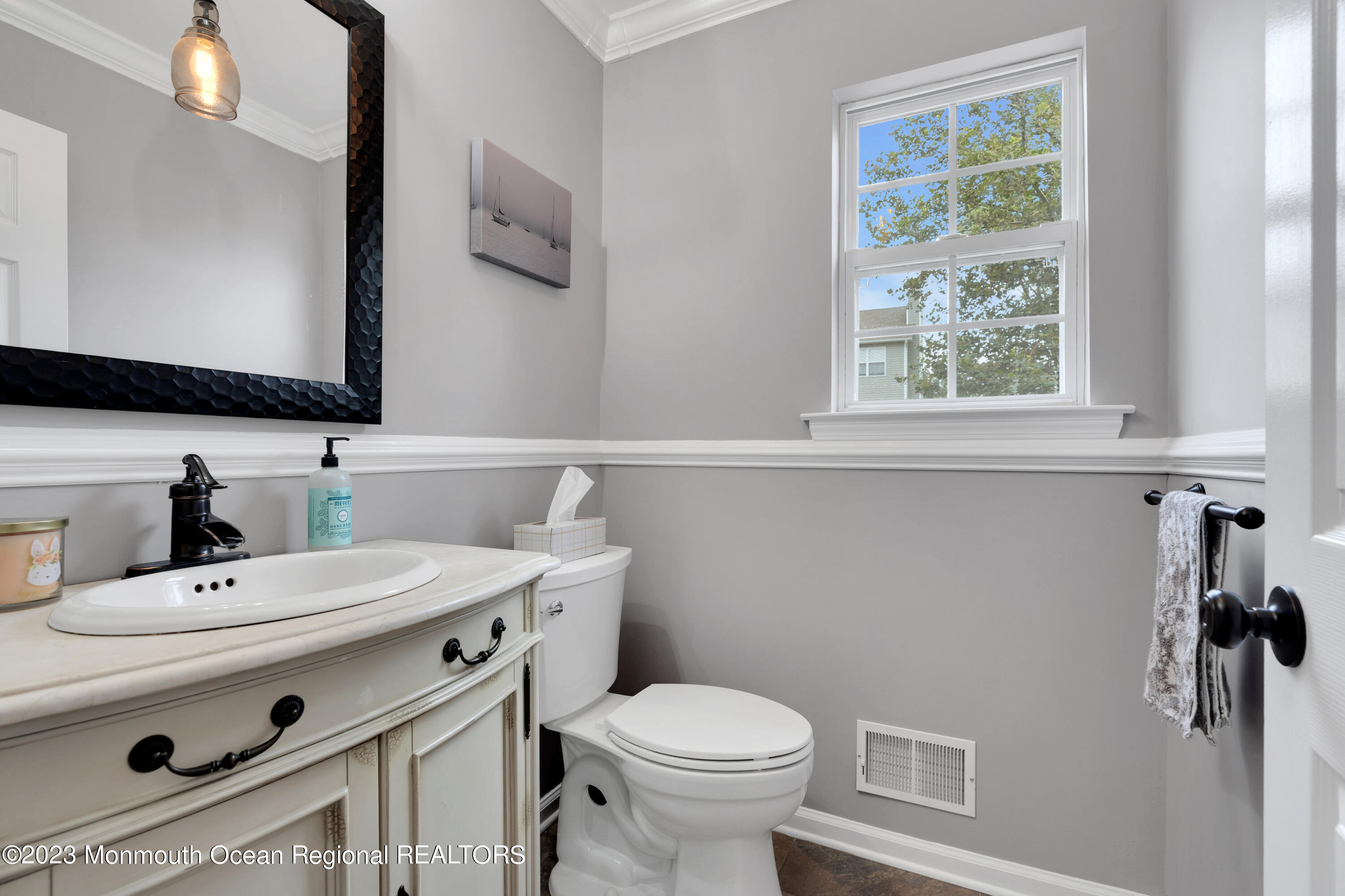 5 Autumn Drive Howell, NJ 07731 - Photo 9 of 50 a bathroom with a sink a toilet and a mirror