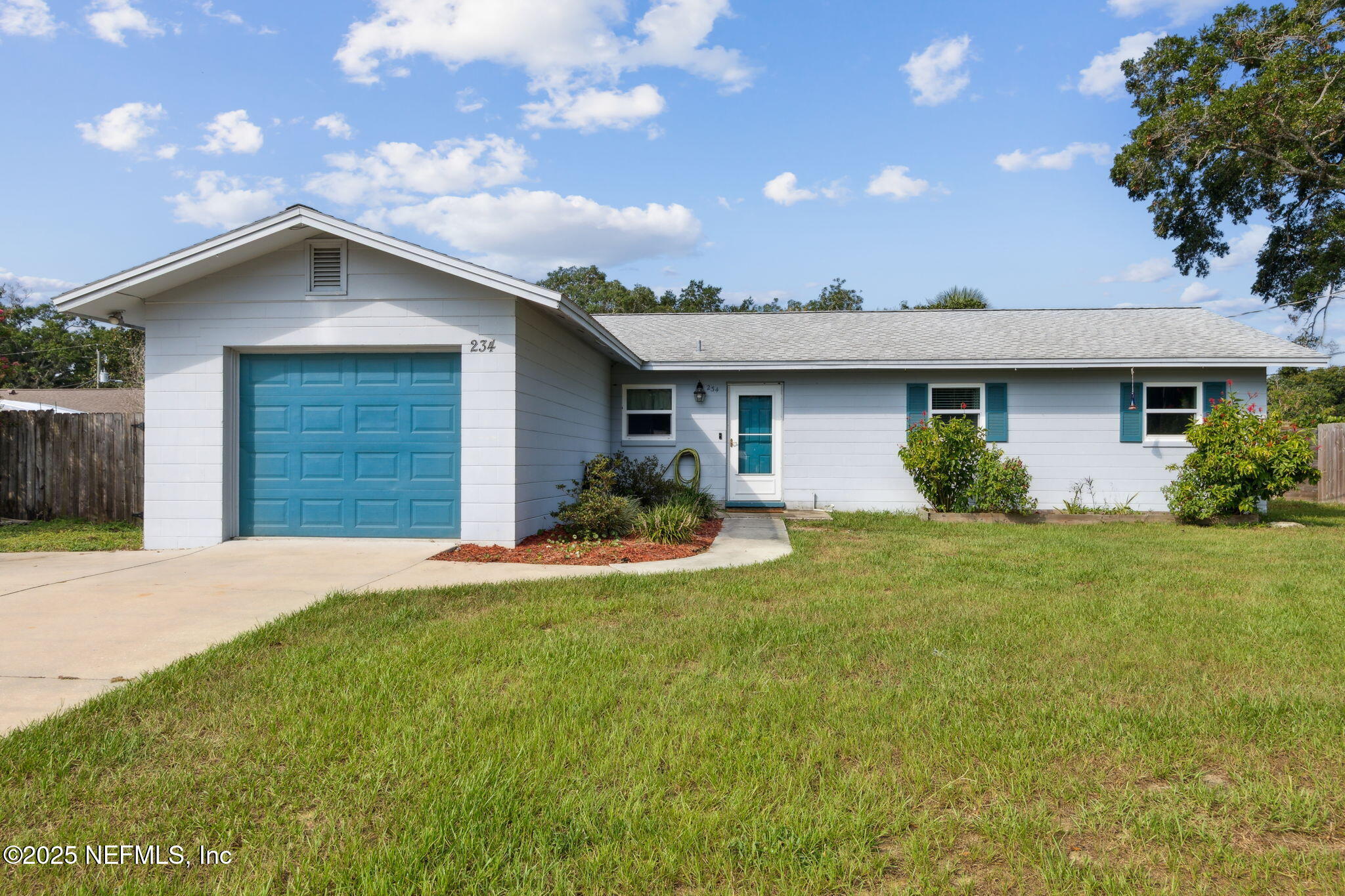234 Hawthorne Road St. Augustine, FL 32086 - Photo 1 of 29 a front view of a house with garden