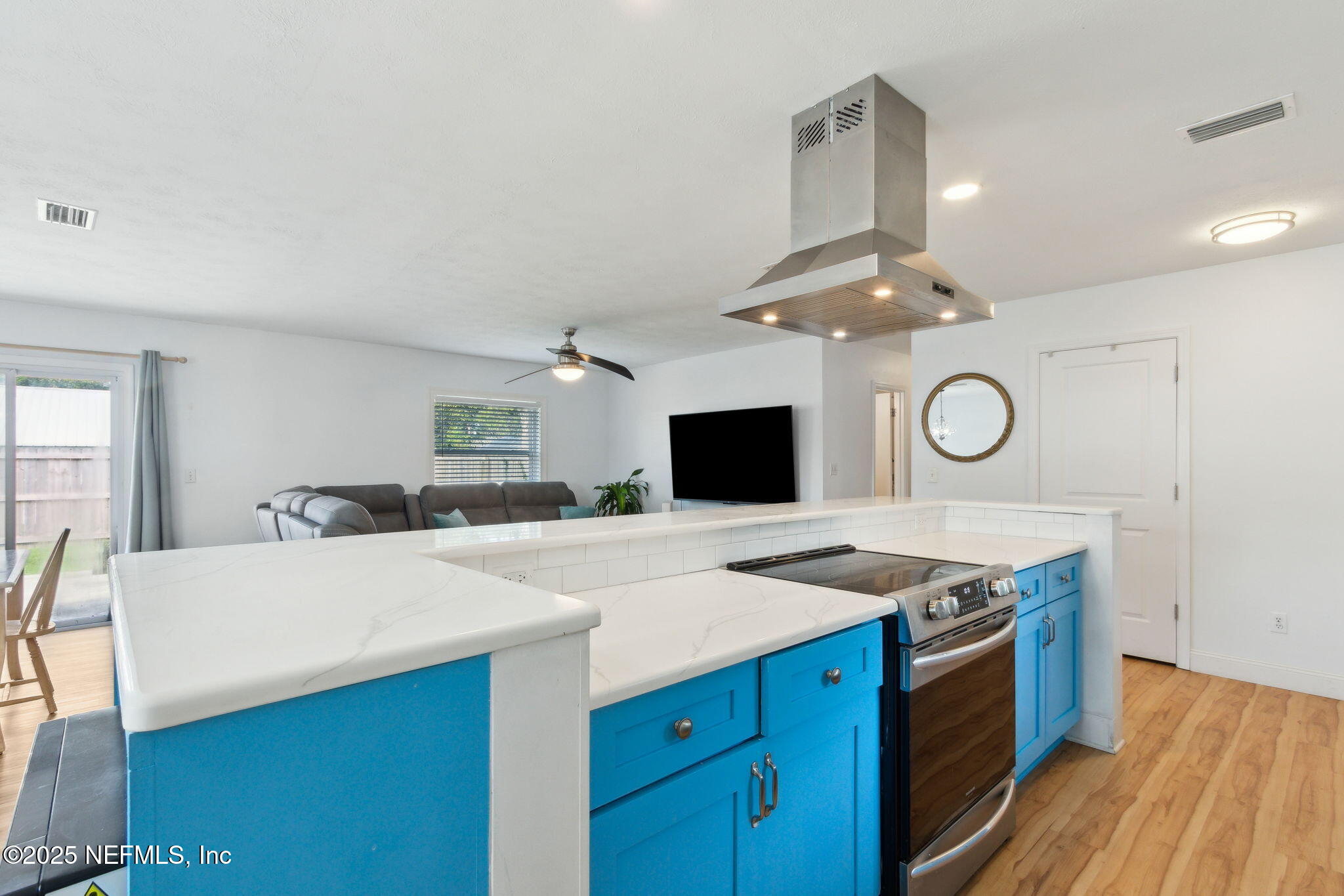 234 Hawthorne Road St. Augustine, FL 32086 - Photo 11 of 29 a kitchen with a stove and a table