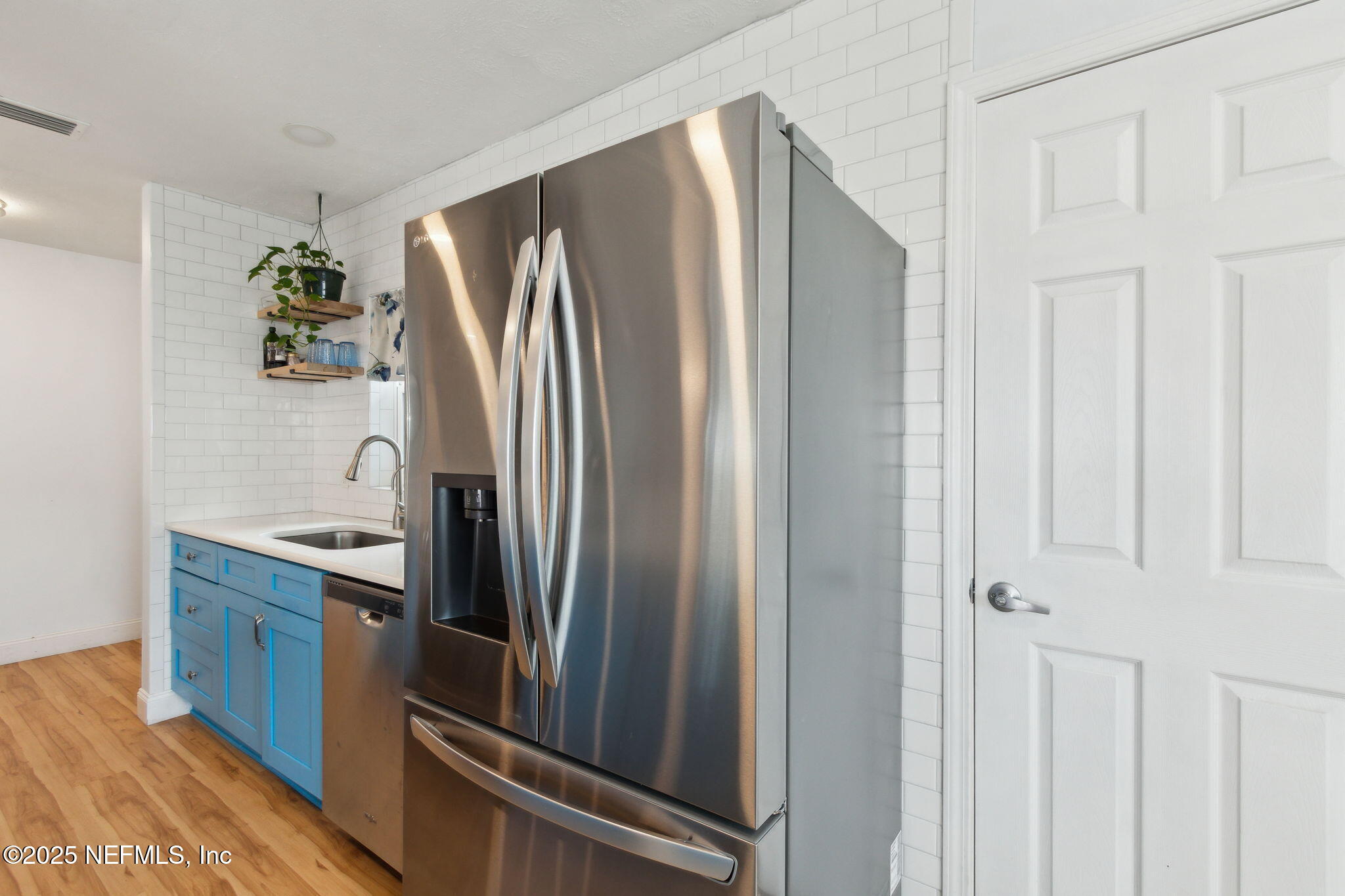 234 Hawthorne Road St. Augustine, FL 32086 - Photo 12 of 29 a kitchen with stainless steel appliances granite countertop a refrigerator and a sink