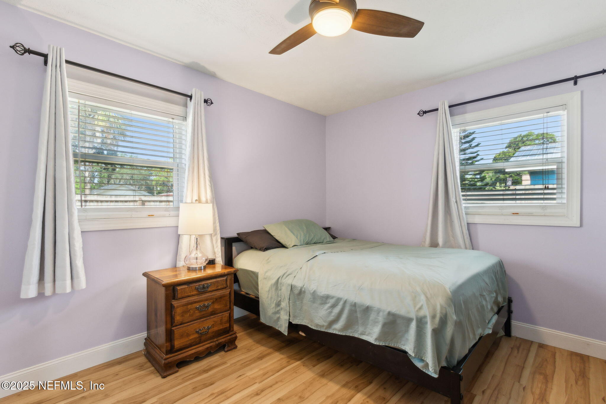 234 Hawthorne Road St. Augustine, FL 32086 - Photo 17 of 29 a bedroom with a bed and a window