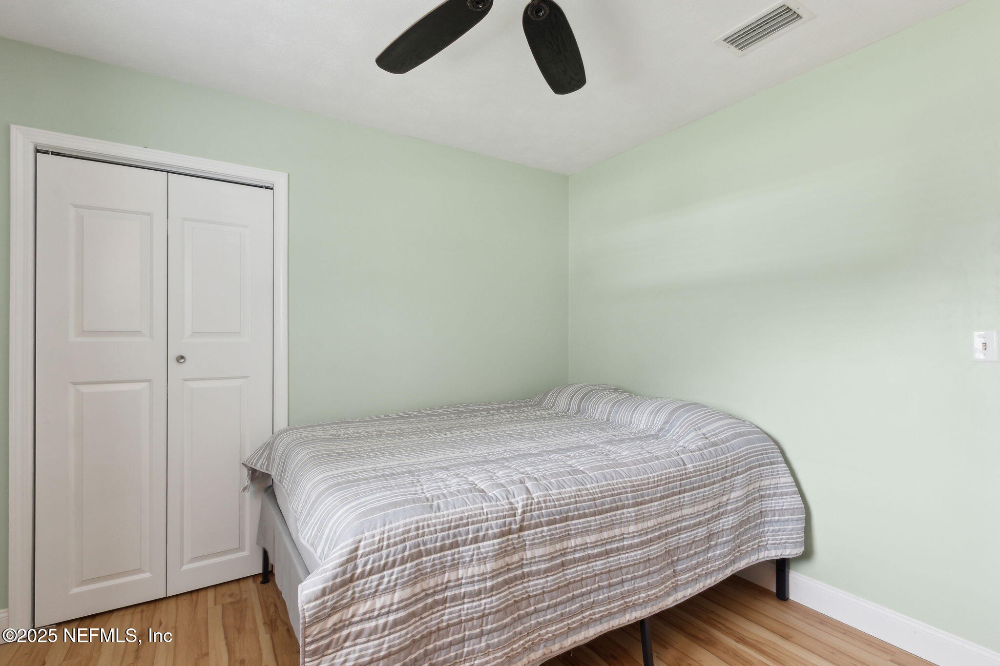 234 Hawthorne Road St. Augustine, FL 32086 - Photo 22 of 29 a bedroom with a bed and a window
