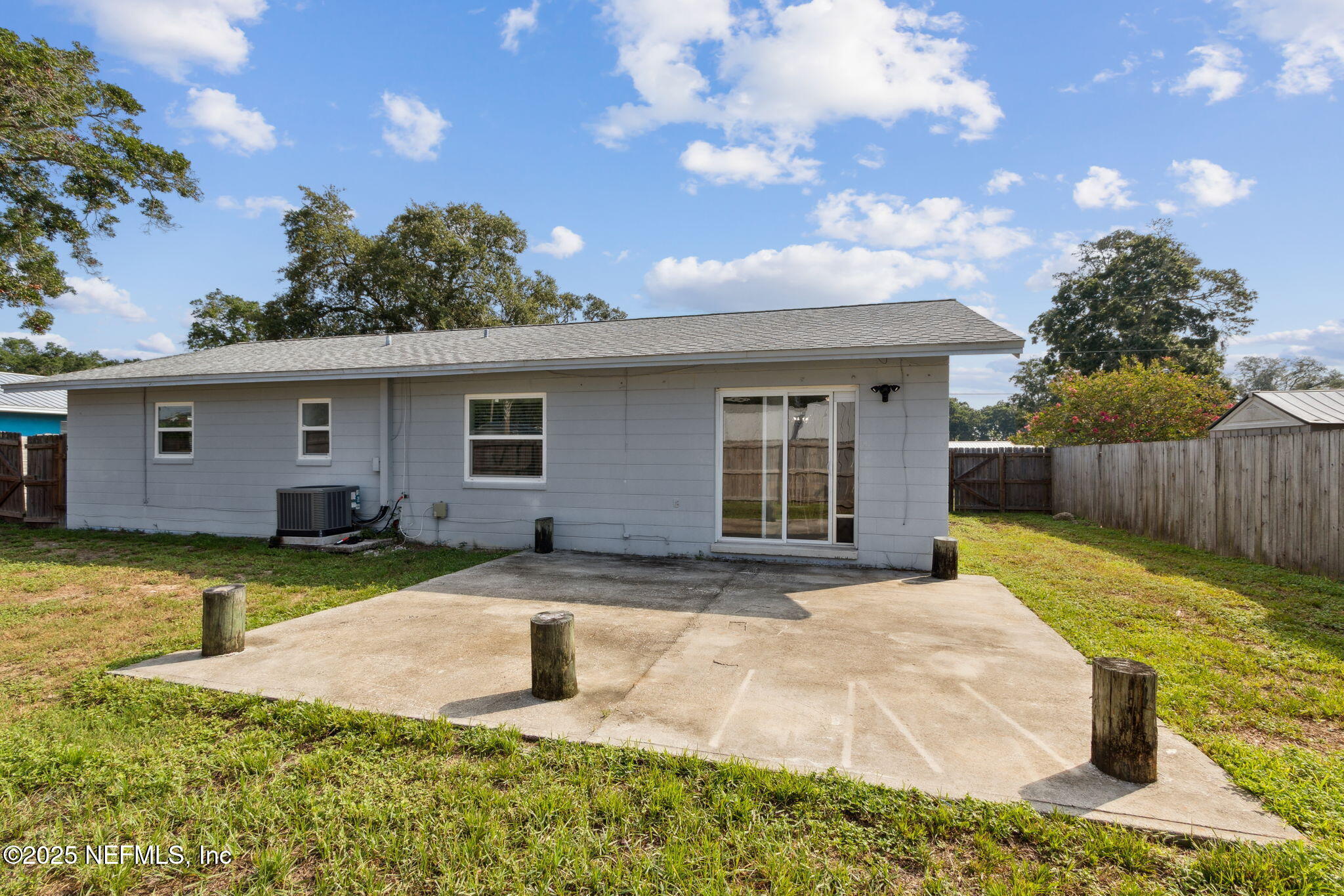 234 Hawthorne Road St. Augustine, FL 32086 - Photo 27 of 29 a view of a house with backyard and sitting area
