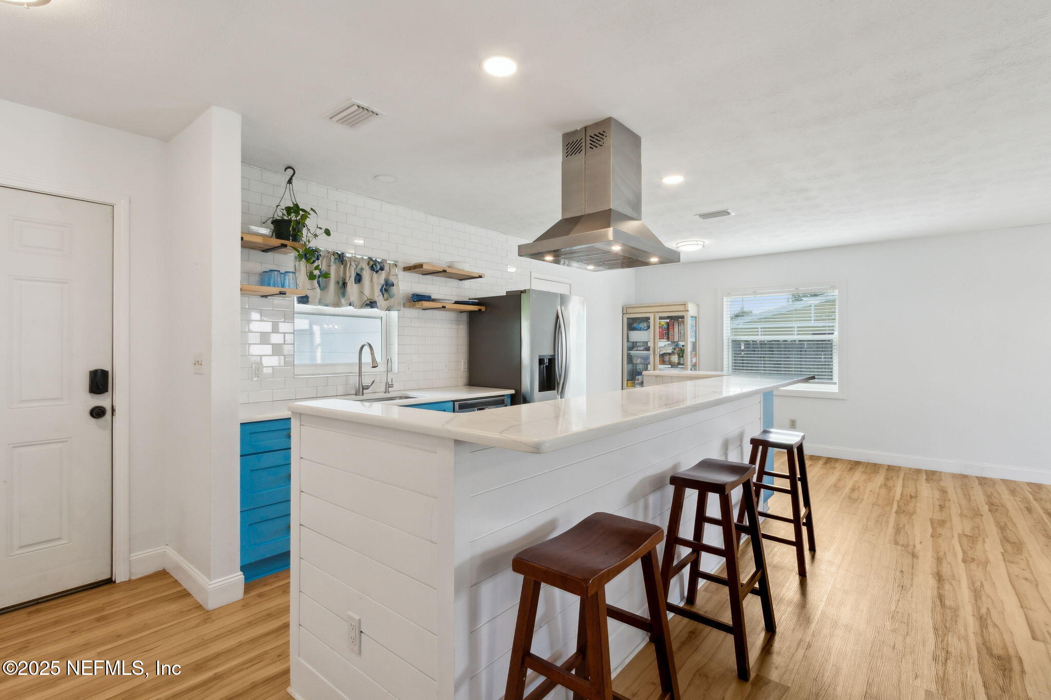 234 Hawthorne Road St. Augustine, FL 32086 - Photo 8 of 29 a kitchen with stainless steel appliances kitchen island a chandelier