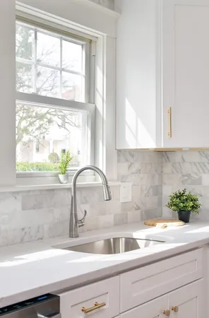 a close view of sink and cabinets