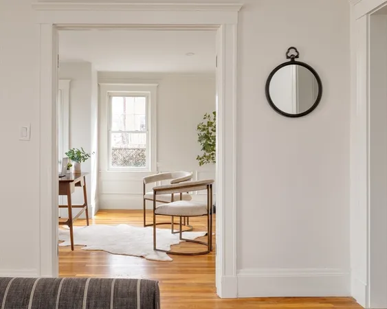 a view of livingroom with furniture and window