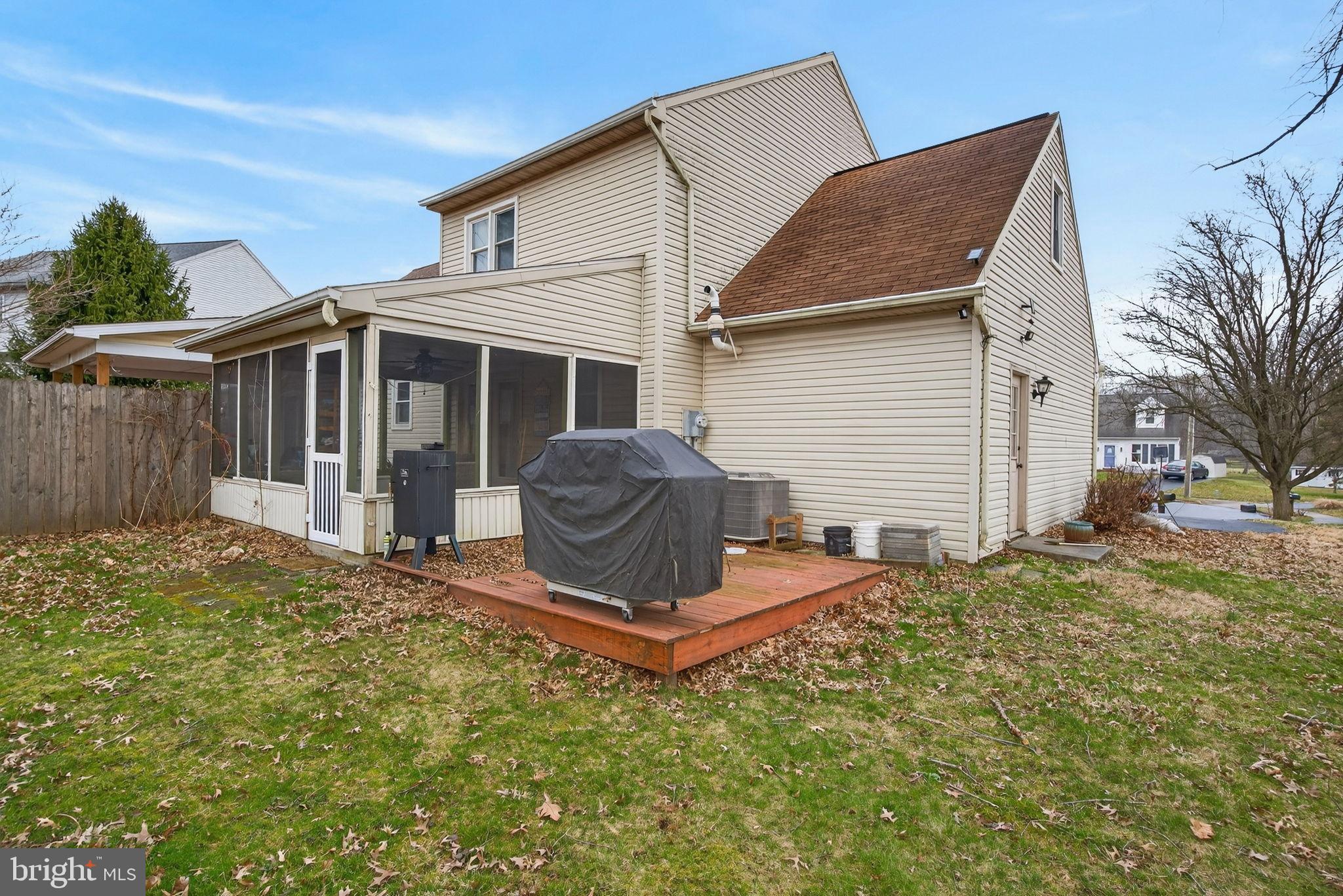 64 Beech Lane Elizabethtown, PA 17022 - Photo 23 of 26 a front view of house with yard outdoor seating and barbeque oven