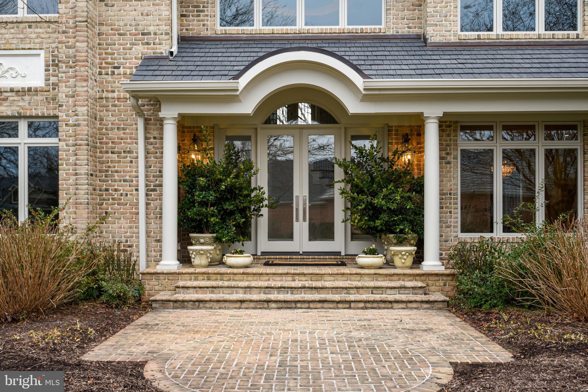 680 South River Landing Road Edgewater, MD 21037 - Photo 11 of 83 Brick walkway and courtyard to arched portico