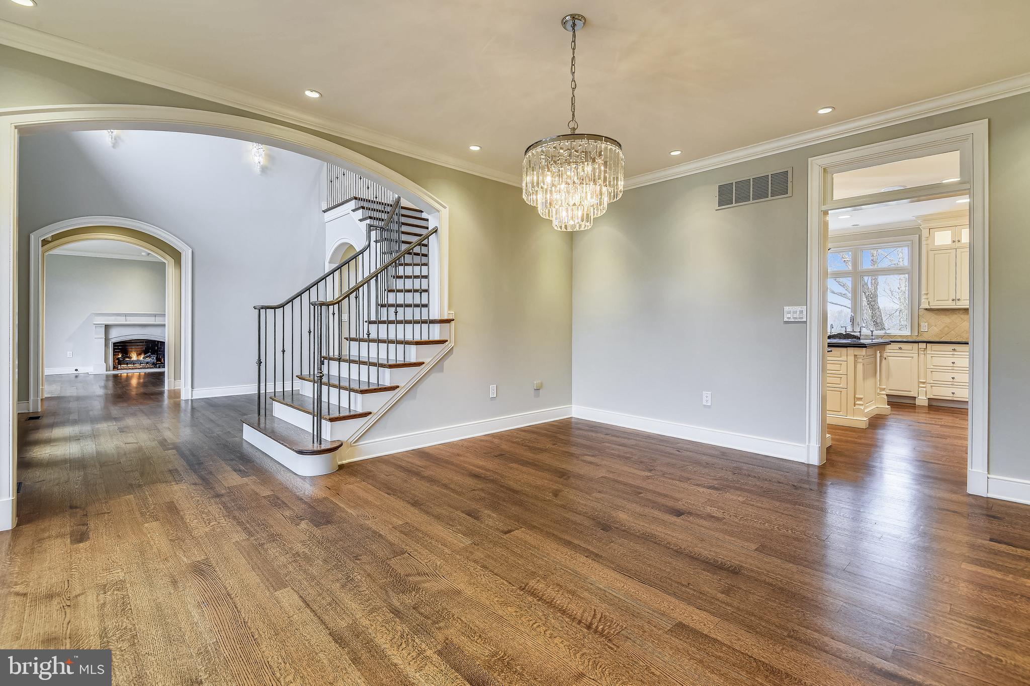 680 South River Landing Road Edgewater, MD 21037 - Photo 15 of 83 Formal dining room with radiant crystal chandelier