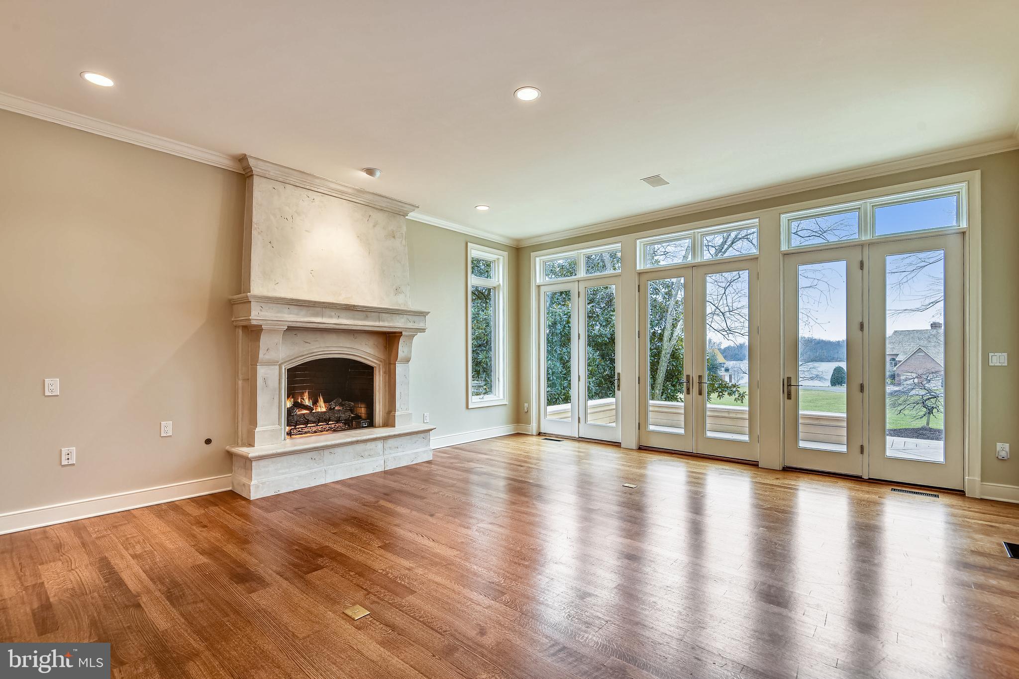680 South River Landing Road Edgewater, MD 21037 - Photo 20 of 83 Great Rm showcases a gas fp under10-ft ceilings