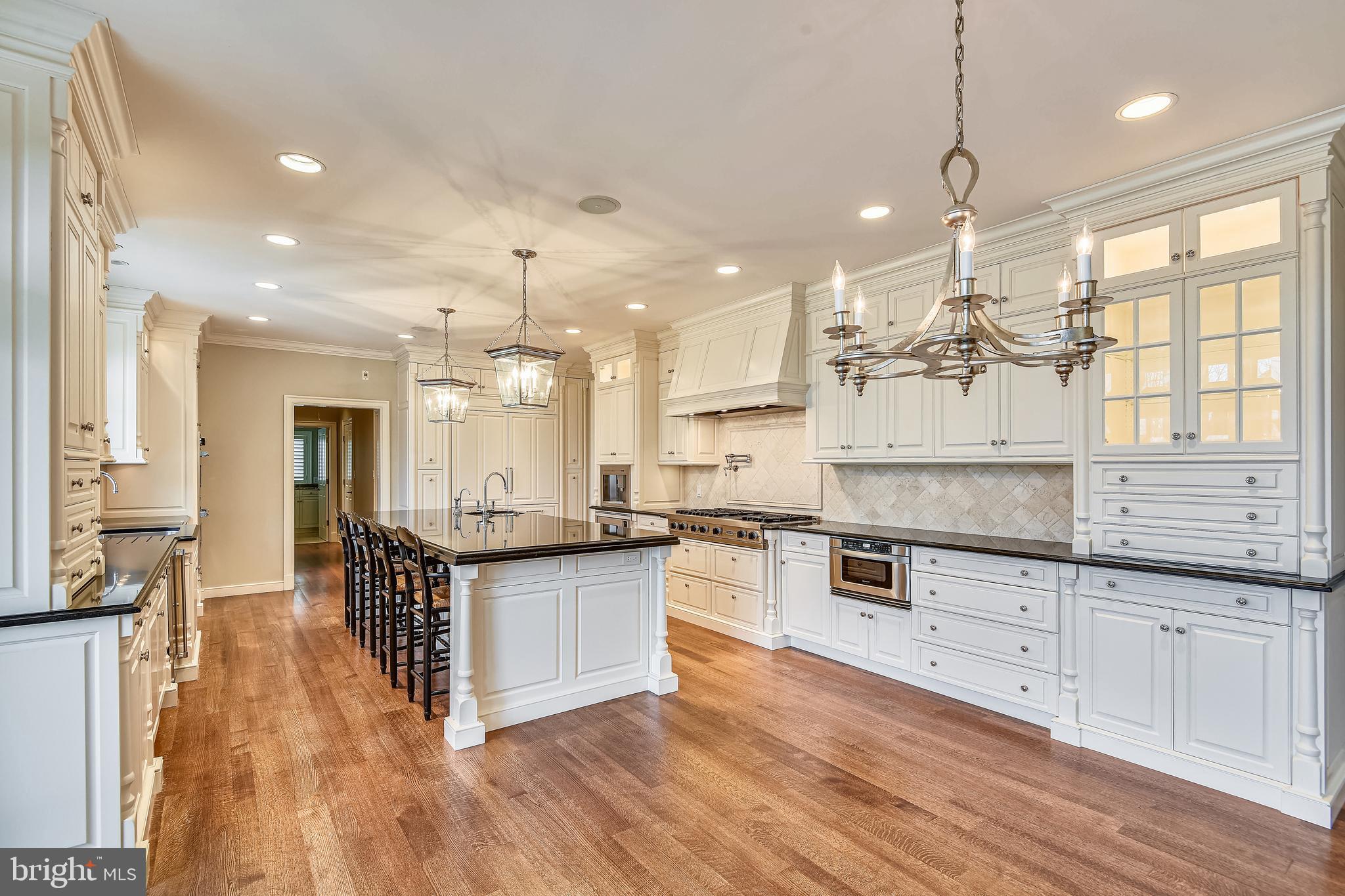 680 South River Landing Road Edgewater, MD 21037 - Photo 27 of 83 Creamy maple cabinetry tumbled marble backsplash