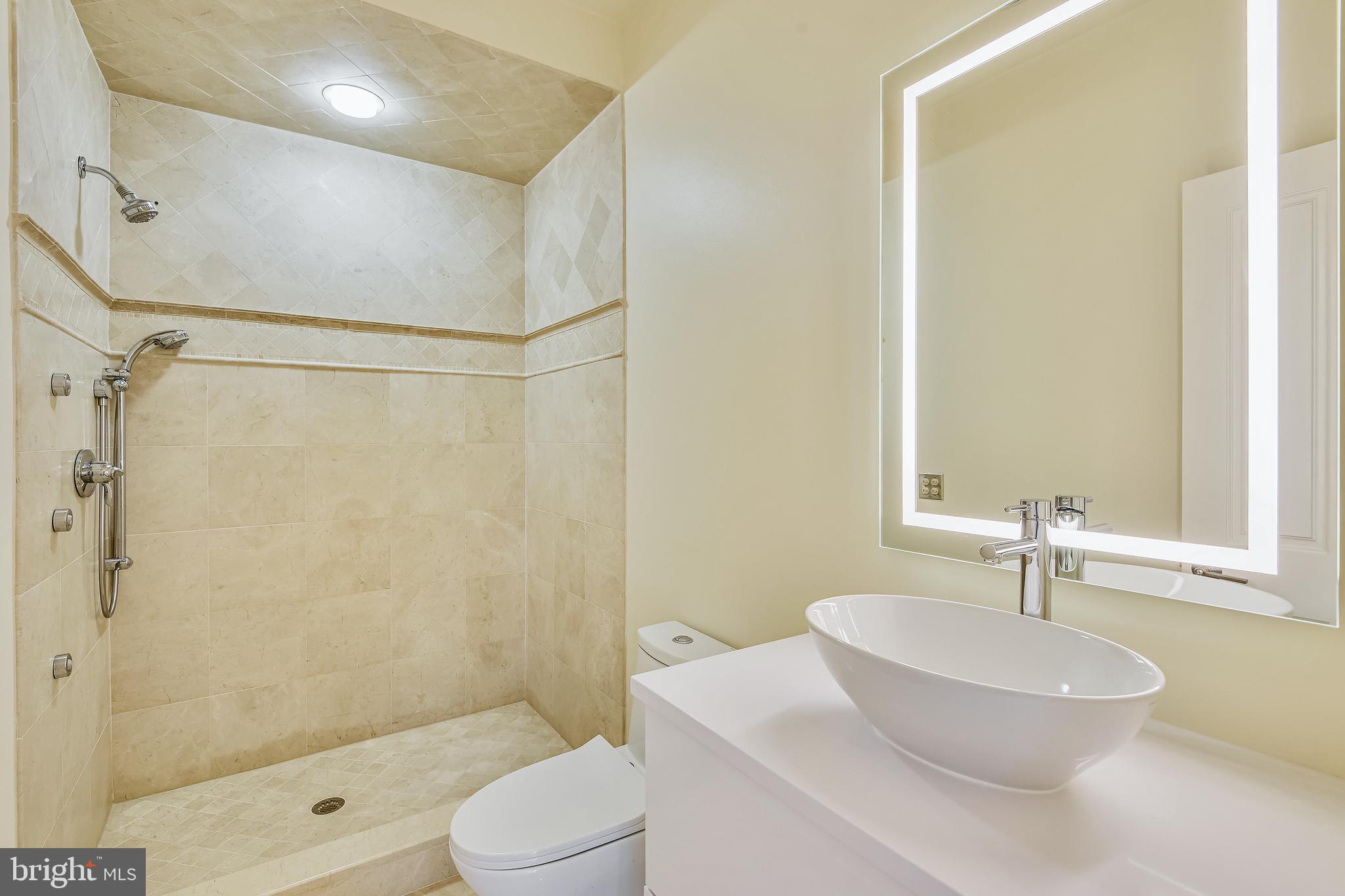 680 South River Landing Road Edgewater, MD 21037 - Photo 44 of 83 Travertine bath with floating vanity near Foyer
