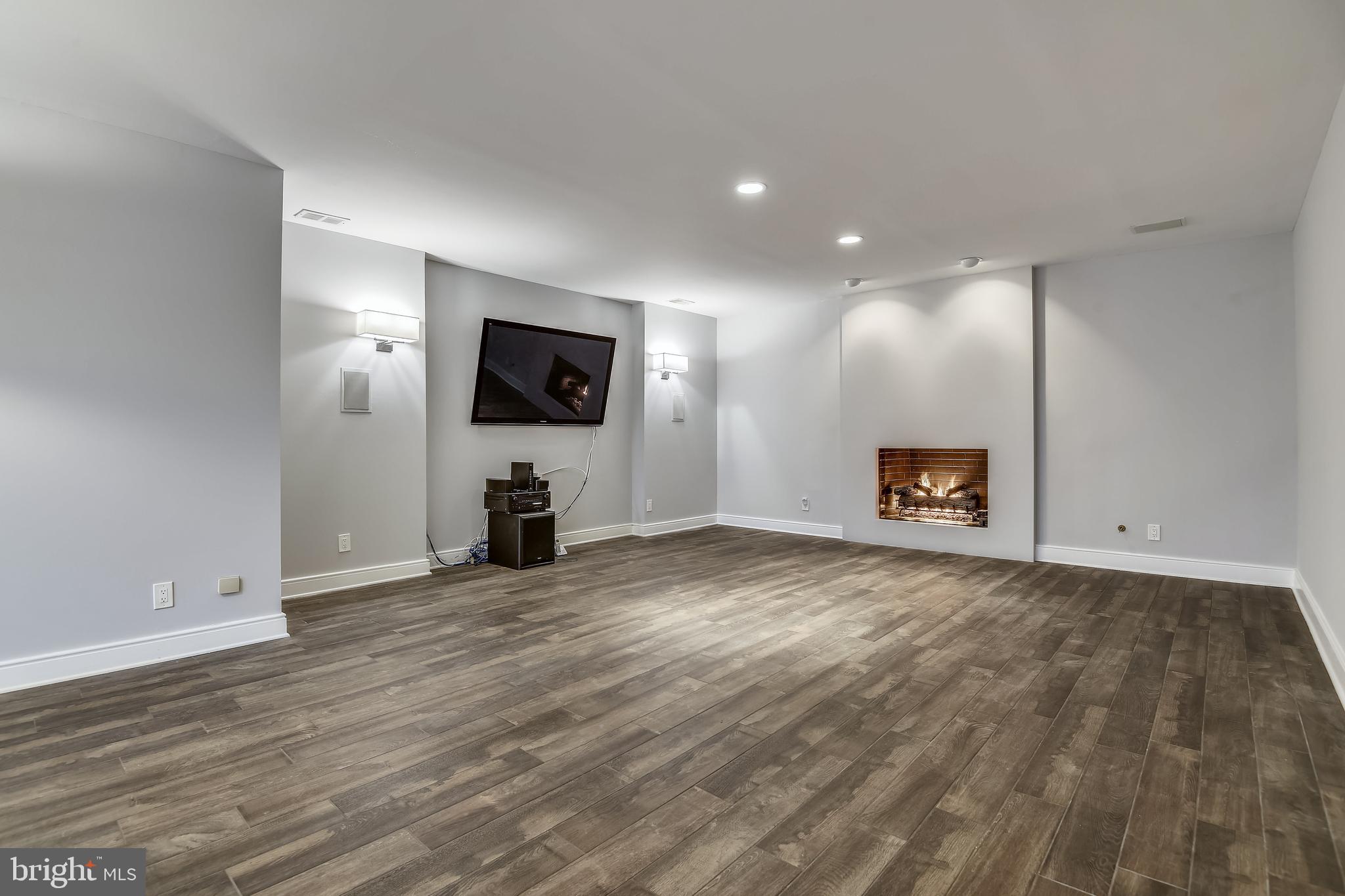 680 South River Landing Road Edgewater, MD 21037 - Photo 68 of 83 Media Rm with gas fireplace and flatscreen TV