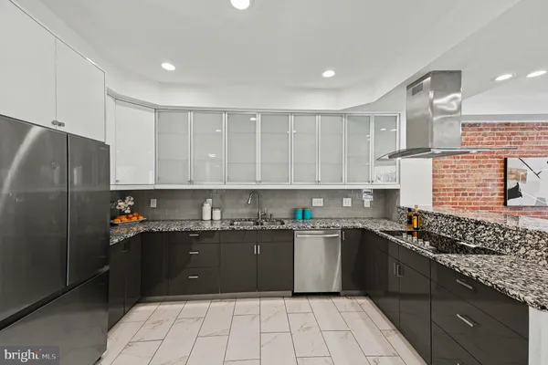 a view of kitchen with furniture and window