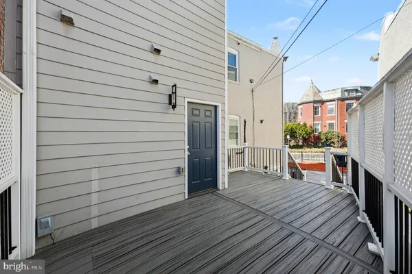 a swimming pool with outdoor seating and yard