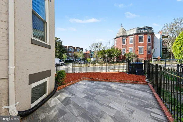 a view of a street with sitting area