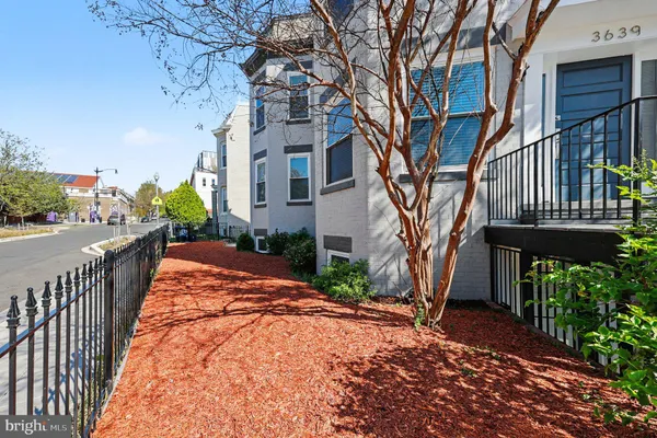 a front view of a building with street view