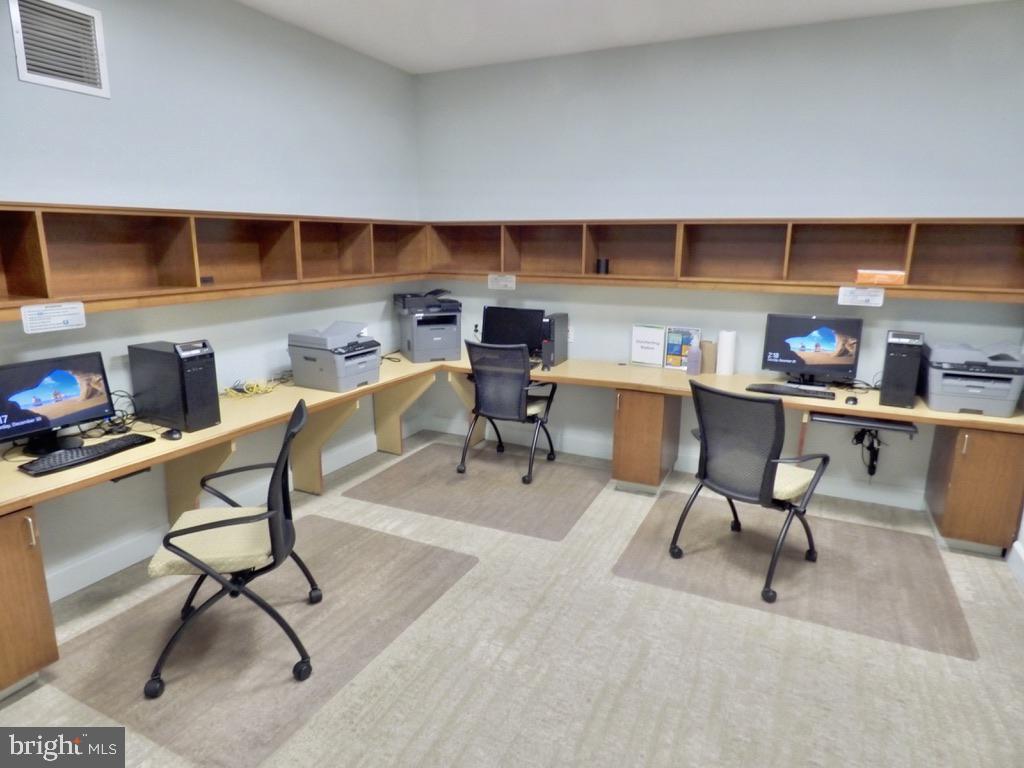 11800 Sunset Hills Road, Unit 118 Reston, VA 20190 - Photo 36 of 52 Modern workspace with tech amenities.