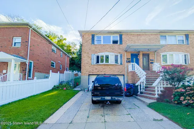 a house view with a garden space
