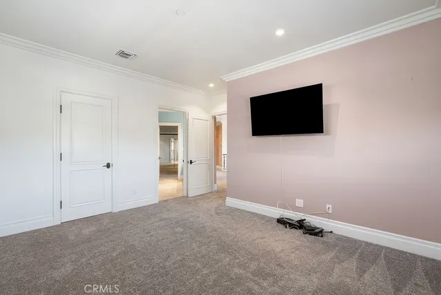a view of a livingroom with a flat screen tv