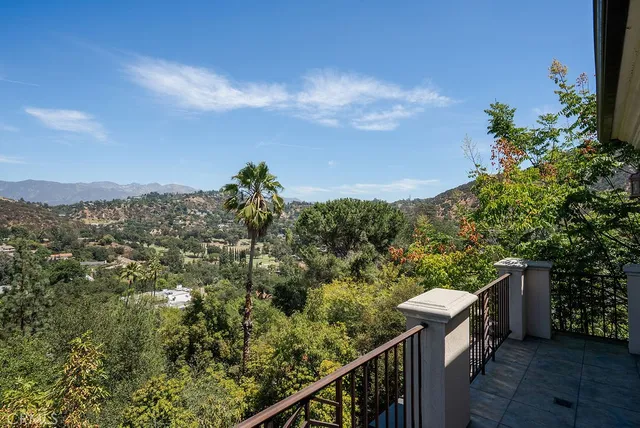 a view of a city from a balcony