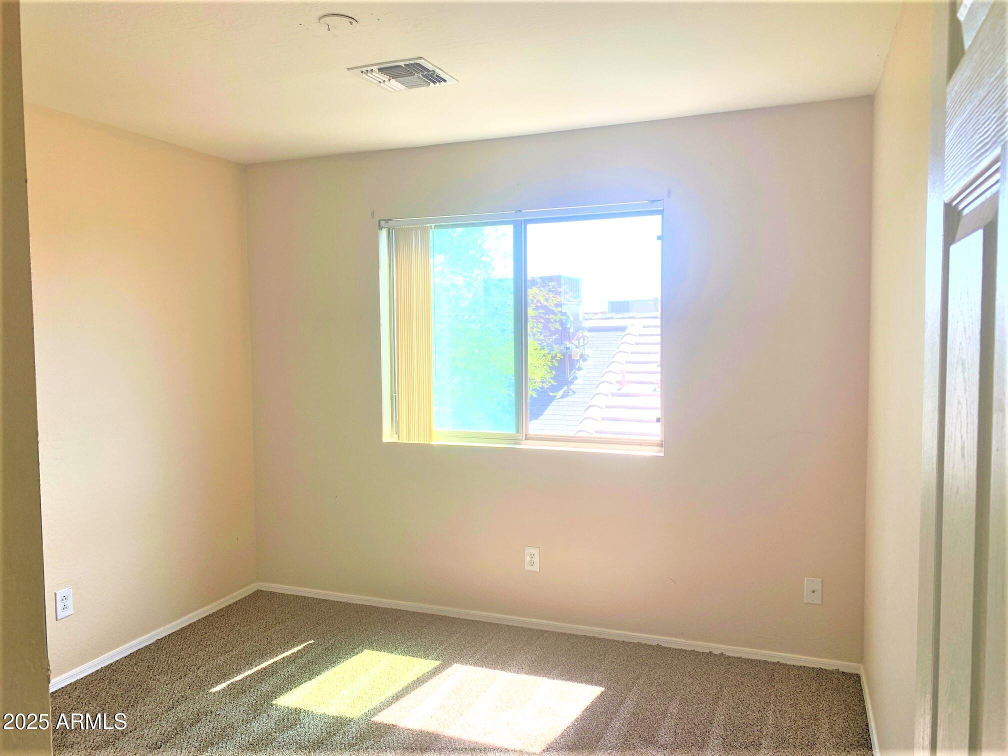 6698 East Summerset Road Florence, AZ 85132 - Photo 9 of 16 a view of empty room with window