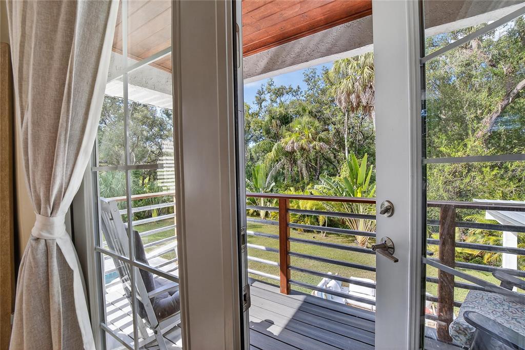 3309 Timberlee Road Wimauma, FL 33598 - Photo 22 of 56 a view of a balcony with wooden floor