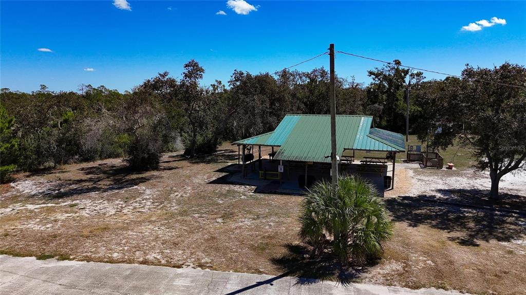 3309 Timberlee Road Wimauma, FL 33598 - Photo 47 of 56 a view of a terrace with a garden