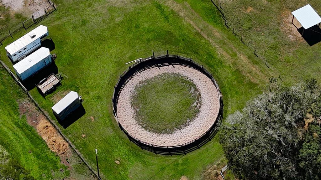 3309 Timberlee Road Wimauma, FL 33598 - Photo 55 of 56 an aerial view of a house with swimming pool and outdoor space