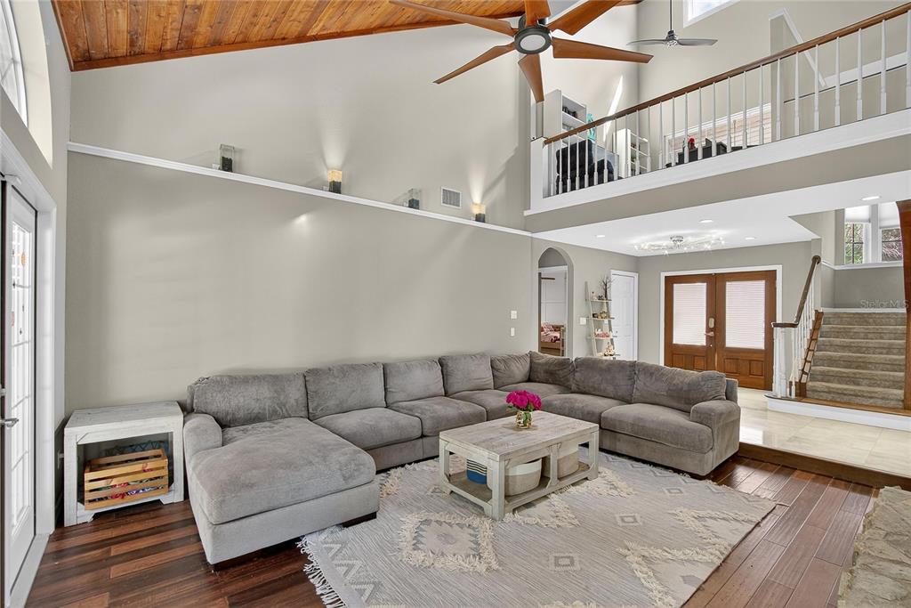 3309 Timberlee Road Wimauma, FL 33598 - Photo 7 of 56 a living room with furniture and a window