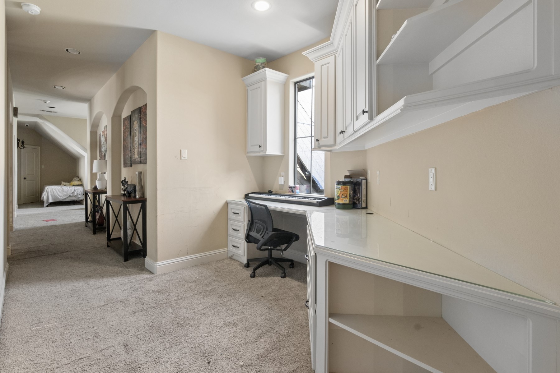 3818 Waterbend Cove Spring, TX 77386 - Photo 34 of 44 a view of a hallway with workspace and entryway