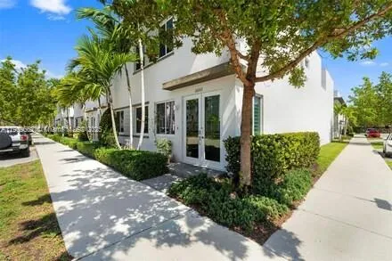 a view of a house with a garden