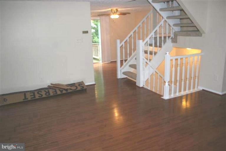15081 Mill Spring Drive Dumfries, VA 22025 - Photo 5 of 13 a view of entryway and hall with wooden floor