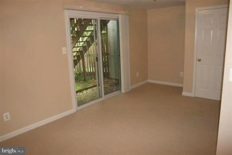 15081 Mill Spring Drive Dumfries, VA 22025 - Photo 8 of 13 a view of a room that has a large window